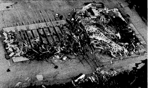 The destroyed trucking plant in Wheatland. A portion of the structure has been swept completely away. Credit: NOAA