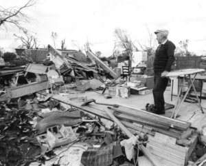 Guy Atkinson surveys his demolished home in Oelwein. Credit: KCRG-TV