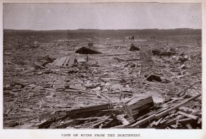 Debris from Pomeroy strewn across a neighboring field Credit: NOAA