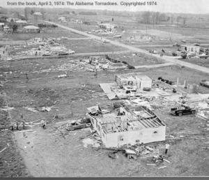 One of a couple of pictures of some lighter damage in the Tanner area, probably F2 to F3, with some homes in the background almost entirely destroyed. Credit: NOAA