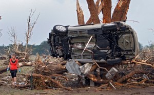This car was wedge in a tree and speared with a wooden missile by the force of the wind. Credit: unknown