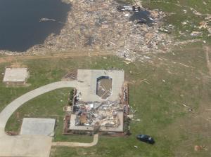 This well-built brick home was completely swept away, the debris thrown forty yards away. Credit: NOAA
