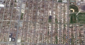 A satellite image of the incredible devastation. In the section between Grand and Iowa Avenues in the upper right of the picture near the athletic fields, multiple swept away homes can be seen. Credit: Google Earth