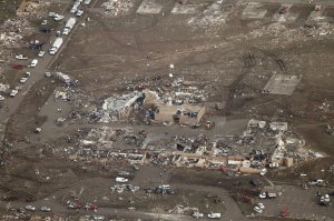 Plaza Towers Elementary after the tornado. Note the entire row of swept away homes behind it. Credit: Steve Gooch/AP