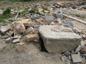A chunk of the foundation at this leveled Rainsville home was pulled out of the ground by the force of the wind. Credit: NOAA