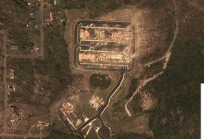 Aerial view of the extreme damage at the Chastain Manor Apartments. The southeast portion of the complex as well as the clubhouse at the bottom center of the picture have been almost entirely swept away. Credit: NOAA