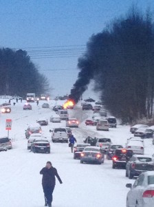 A surreal scene on an interstate near Raleigh as traffic ground to a halt and people abandoned their cars, one of which caught fire.